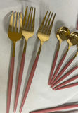 Gold-tone flatware set with white and pink handles and wooden-handled utensils - thumbnail 8 of 10