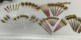 Gold-tone flatware set with white and pink handles and wooden-handled utensils - thumbnail 2 of 10