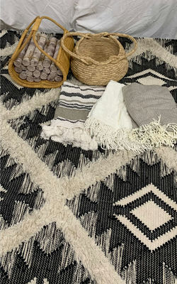 Kenyan Black & white Area Rug, Throw Blankets And Baskets - Image 1 of 12