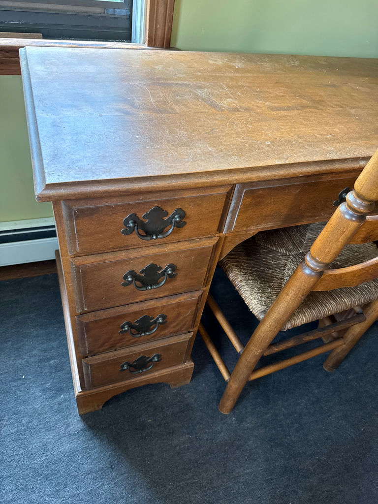 Antique wooden desk with drawers and woven-seat chairs - image 2 of 4