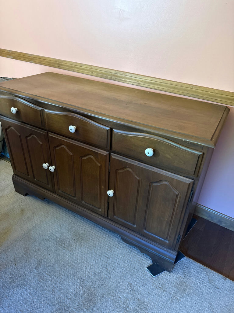 Dark wood sideboard with drawers and cabinet doors - image 1 of 2