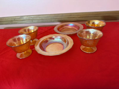 Carnival glass Iridescent amber glass goblets with matching plates - Image 1 of 2