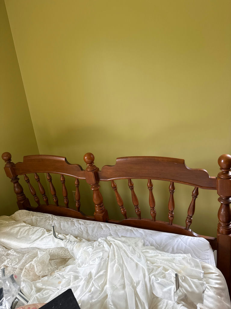 Wooden bed frame with spindle headboard and footboard - image 1 of 3