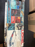 Lionel model railroad set with locomotive, freight cars, and track - thumbnail 1 of 3