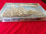 Cutty Sark sailing ship model kit with accompanying model train components - thumbnail 2 of 3