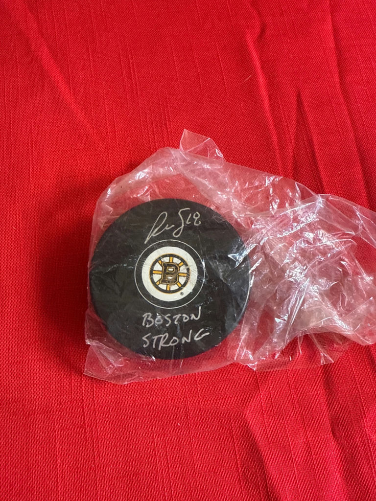 Autographed Boston Bruins hockey puck - image 1 of 2