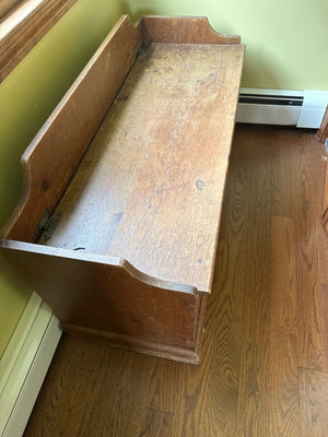 Wooden storage bench with sticker-covered interior - Image 1 of 3