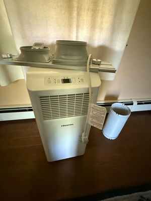 Portable air conditioner with vent kit - Image 1 of 1