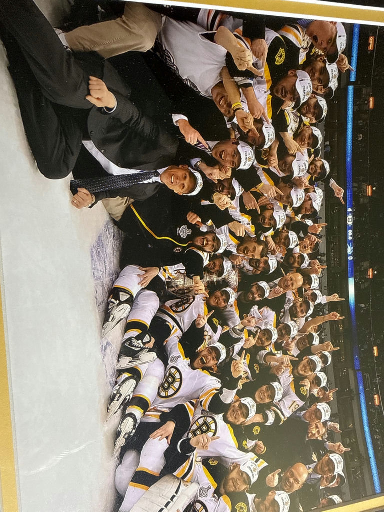 Framed group photo of a Bruins  team celebration - image 3 of 3