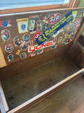 Wooden storage bench with sticker-covered interior - thumbnail 3 of 3