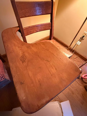 Wooden chair with  desk surface - Image 1 of 2