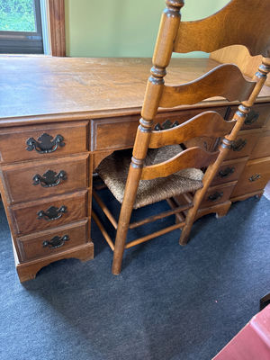 Antique wooden desk with drawers and woven-seat chairs - Image 1 of 4