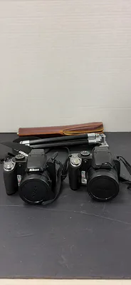 Nikon COOLPIX Digital Cameras with Tripod - Image 1 of 7