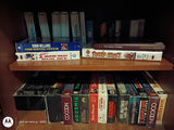 Assorted VHS Tapes, DVDs, and Media Storage Cabinet - thumbnail 1 of 8