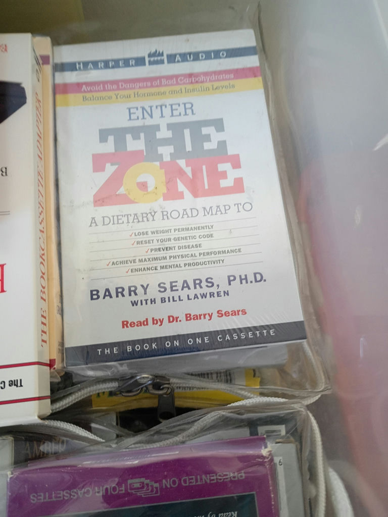 Collection of Audiobook Cassette Tapes in Storage Bins - image 8 of 8