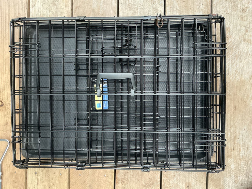 Two expanding white metal pet gates up to 38”  and a pet crate. - image 4 of 6