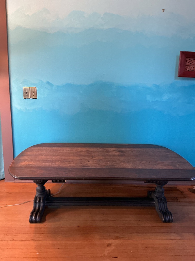 Dark wooden coffee table with ornate carved pedestal bases - image 6 of 7