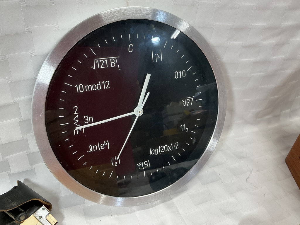 Math-themed clock, slide rule, and vintage desk toys - image 2 of 6