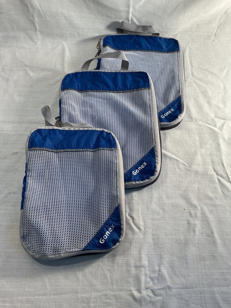 Assorted travel bags: backpack, rolling suitcase, and duffel - image 7 of 11