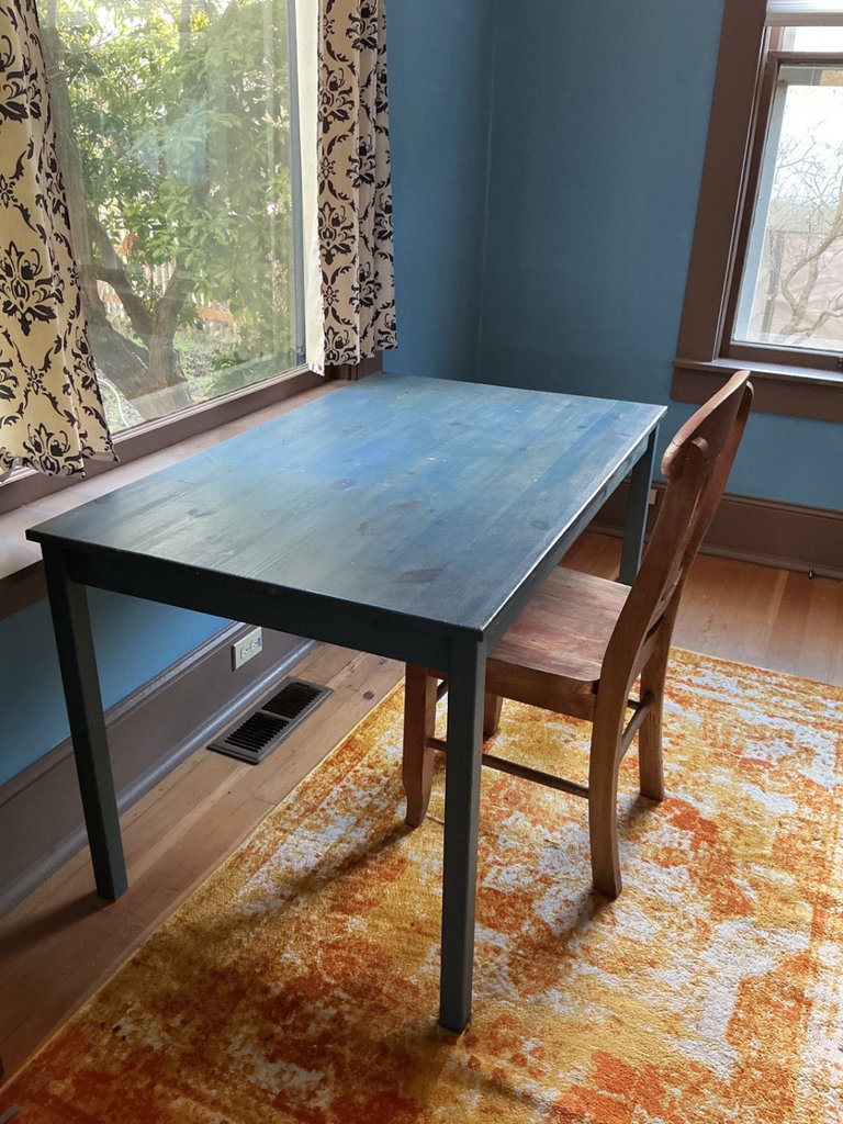 Blue rectangular table with 2 wooden chairs - image 1 of 5