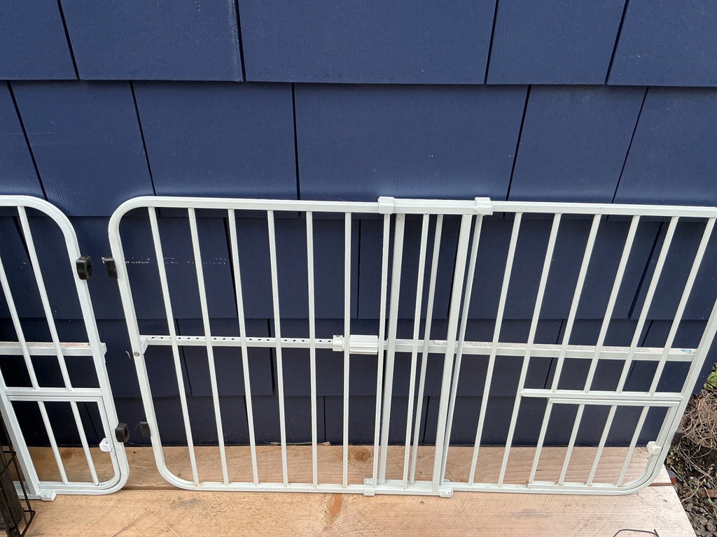 Two expanding white metal pet gates up to 38”  and a pet crate. - image 3 of 6