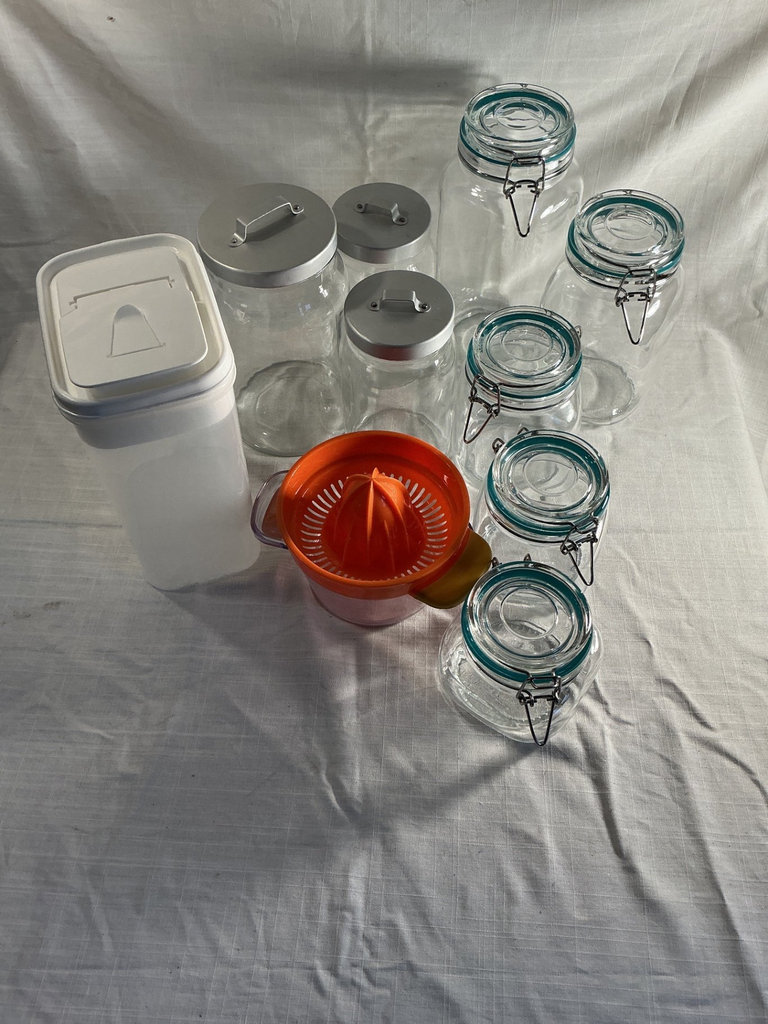 Assorted glass storage jars and juicing set - image 1 of 4