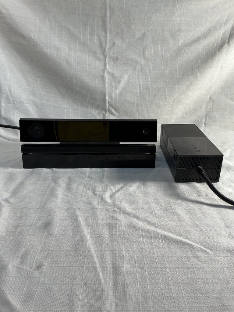 Xbox One X console with three controllers and a game - image 5 of 8