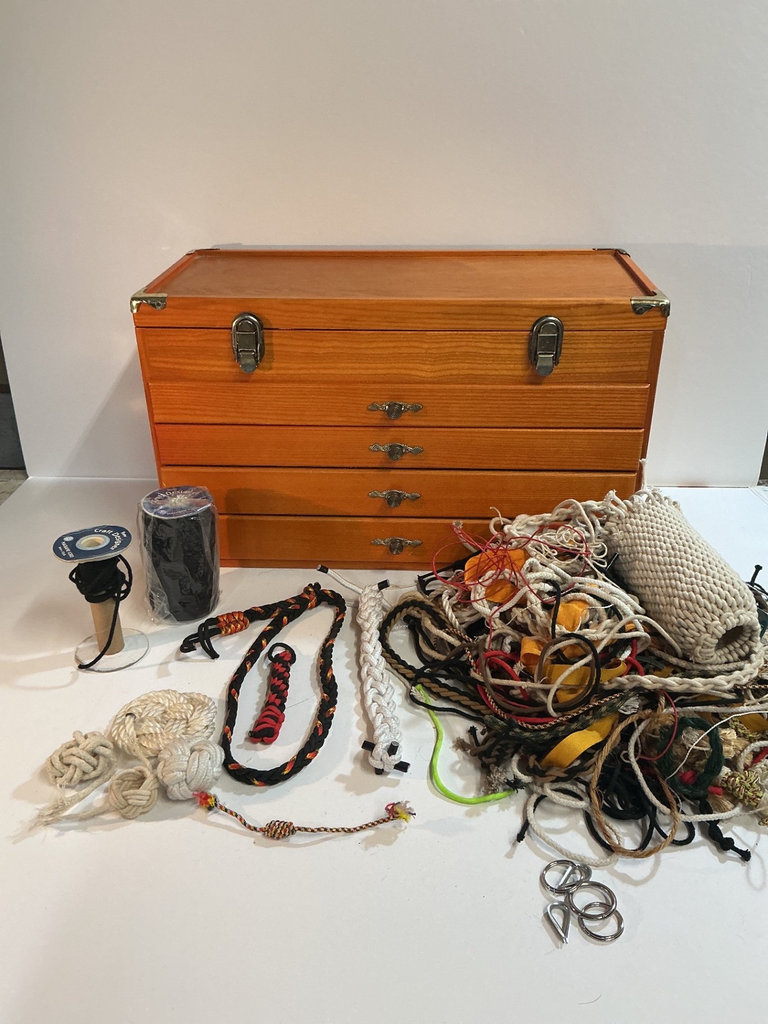 Wooden 4-drawer storage chest with cords and sewing supplies - image 1 of 4