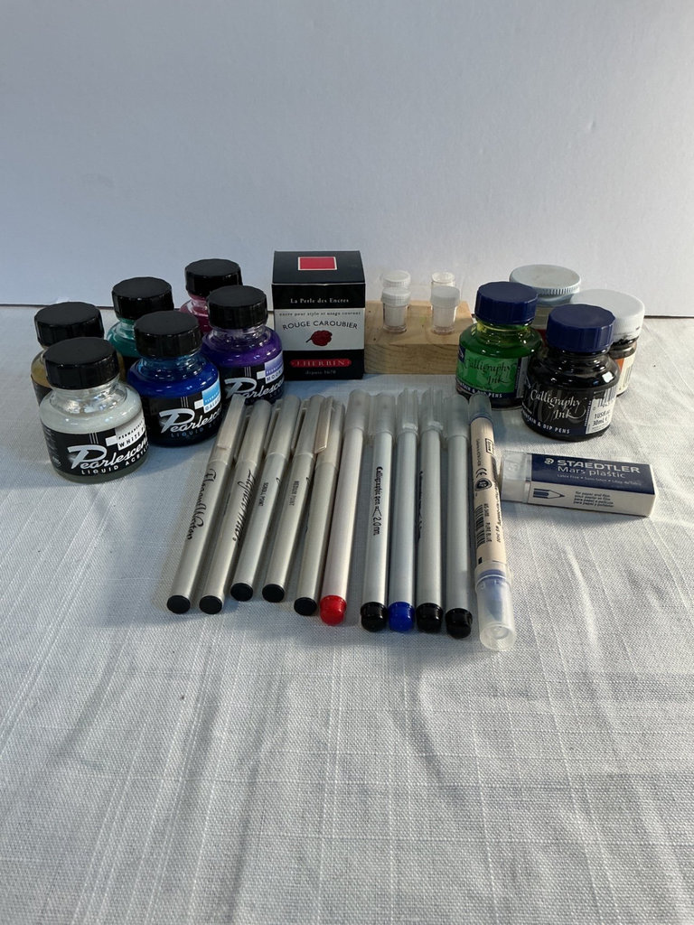 Assorted art supplies and calligraphy books - image 4 of 9