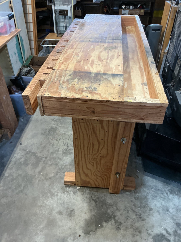 Large wooden workbench with peg-slot edge - image 1 of 4