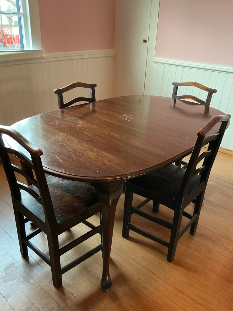 Ethan Allen oval dining table with two leaves and four ladder-back chairs - image 1 of 7