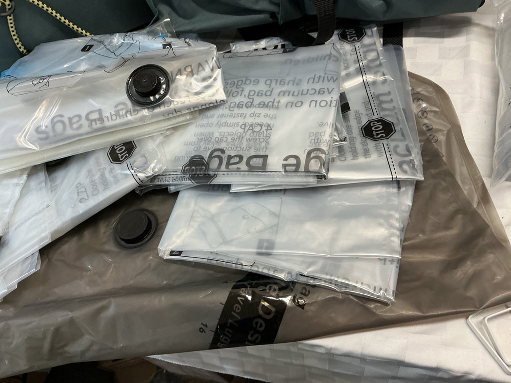 Vacuum storage bags, auto organizer bags, and furniture sliders - image 4 of 5