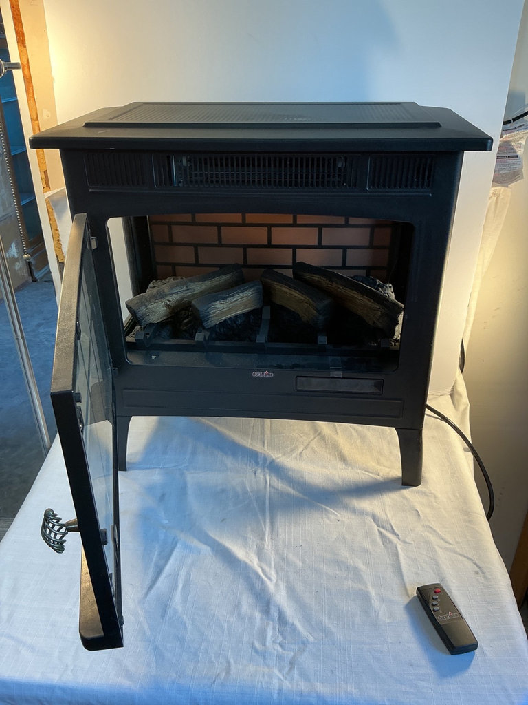 Duraflame electric fireplace stove with remote.  - image 2 of 4