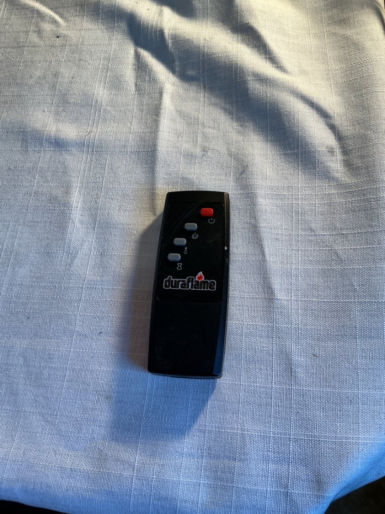Duraflame electric fireplace stove with remote.  - image 4 of 4