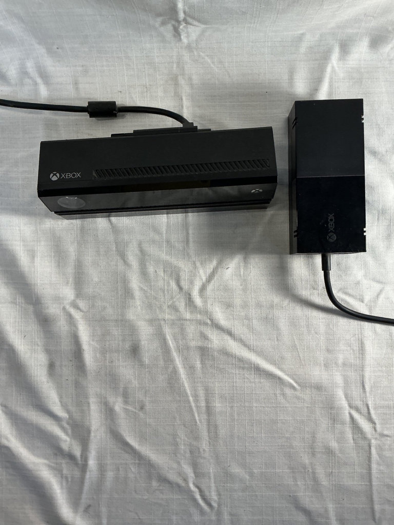 Xbox One X console with three controllers and a game - image 6 of 8
