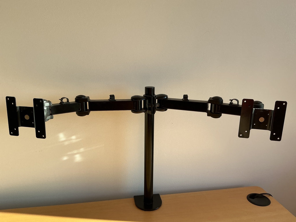 Height-adjustable desk with monitor arm, office chair, and ViewSonic monitors. - image 8 of 13