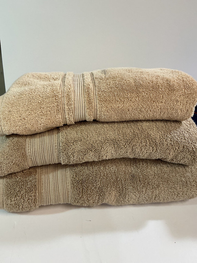 Assorted towels, bath mats and a blanket. - image 2 of 4
