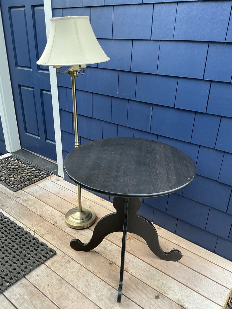 Round black pedestal table and brass floor lamp - image 1 of 5