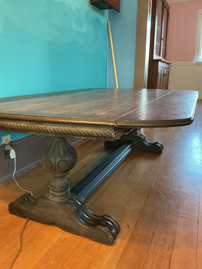 Dark wooden coffee table with ornate carved pedestal bases - image 7 of 7