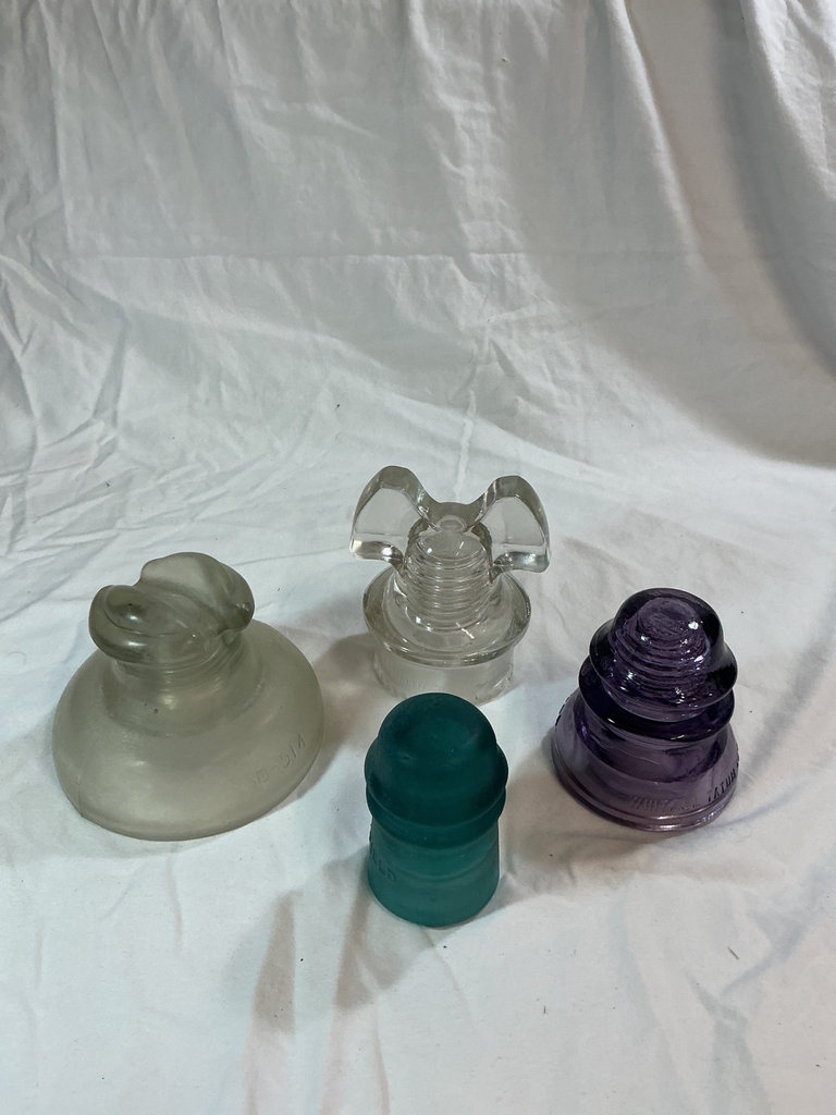4 glass insulators  - image 1 of 6