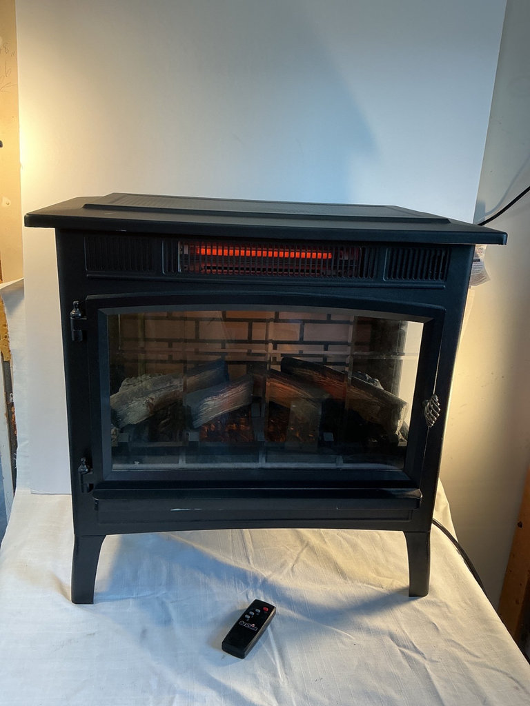Duraflame electric fireplace stove with remote.  - image 1 of 4