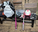 Baseball equipment set with bats, gloves, and helmets - thumbnail 1 of 6