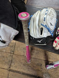 Baseball equipment set with bats, gloves, and helmets - thumbnail 3 of 6