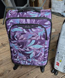 Three rolling suitcases: purple floral, cityscape white, and black - thumbnail 3 of 5