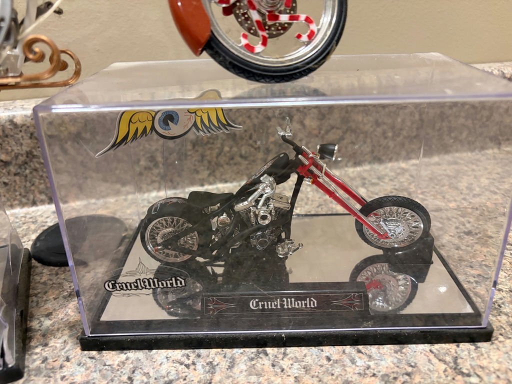 3 Motorcycle Models Displayed - image 2 of 3