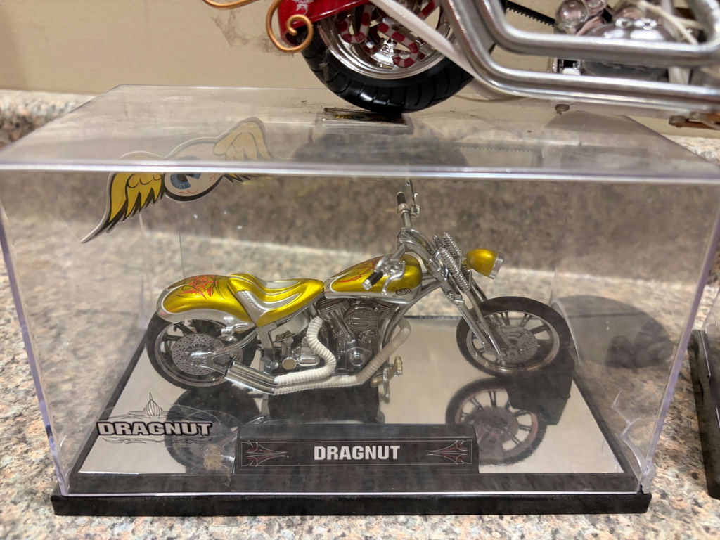 3 Motorcycle Models Displayed - image 3 of 3