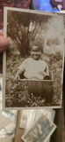 Photo Postcard Young Black Boy In Basket - thumbnail 1 of 2
