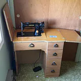 Singer Sewing Machine in Wooden Cabinet - thumbnail 1 of 13