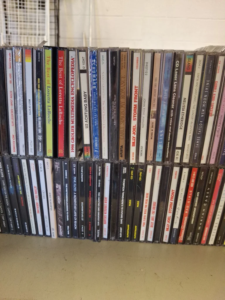 Collection of Music CDs and Disc Storage Cases - image 15 of 22