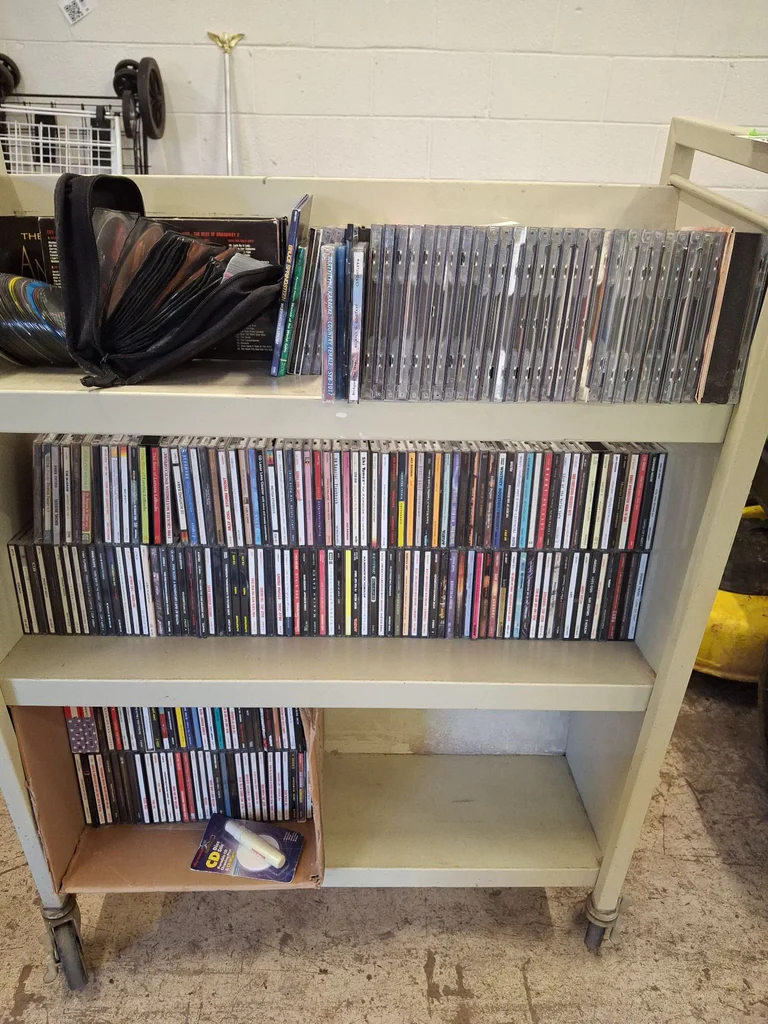 Collection of Music CDs and Disc Storage Cases - image 1 of 22